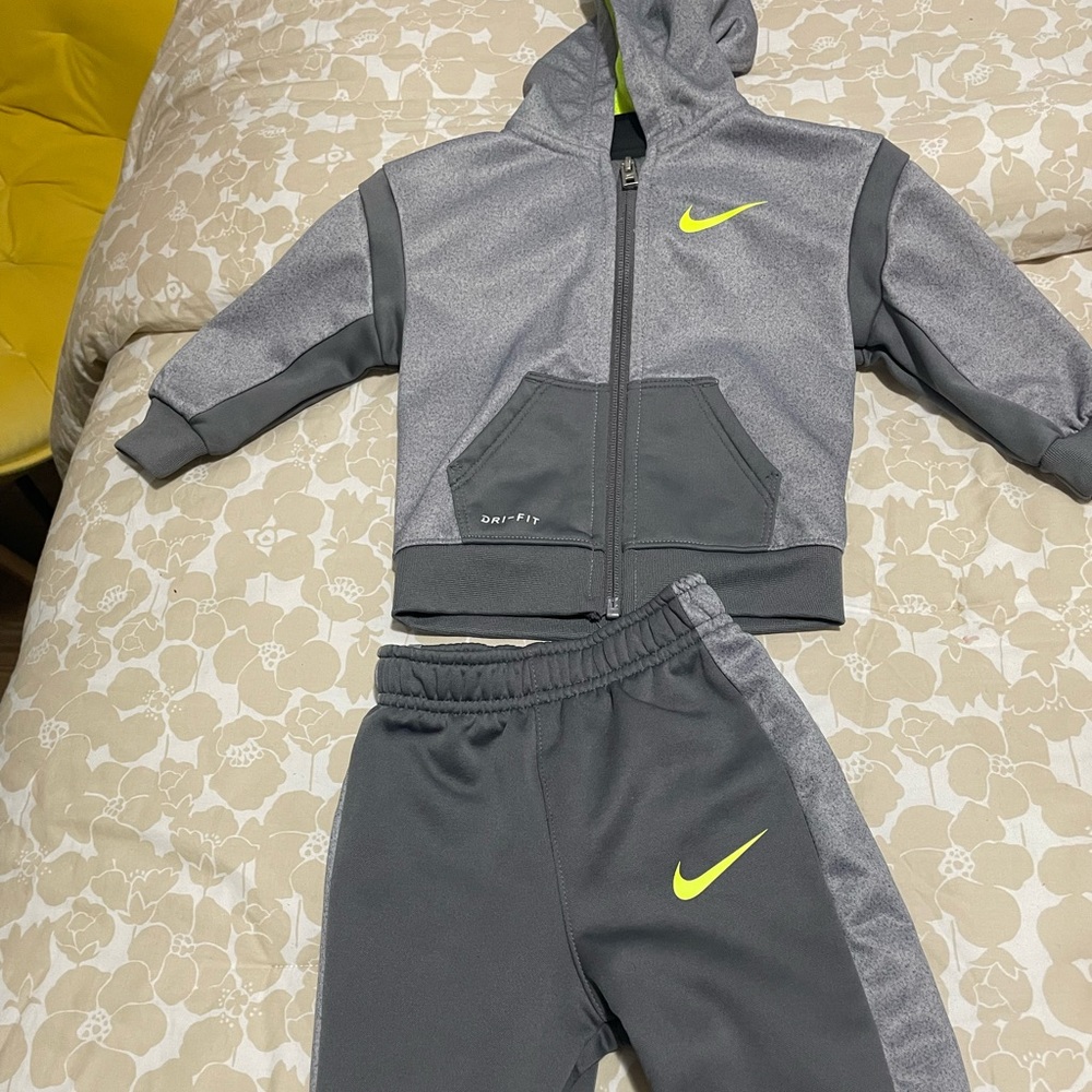 Gray Nike tracksuit for baby boy Perfect condition only wored one time.12 months